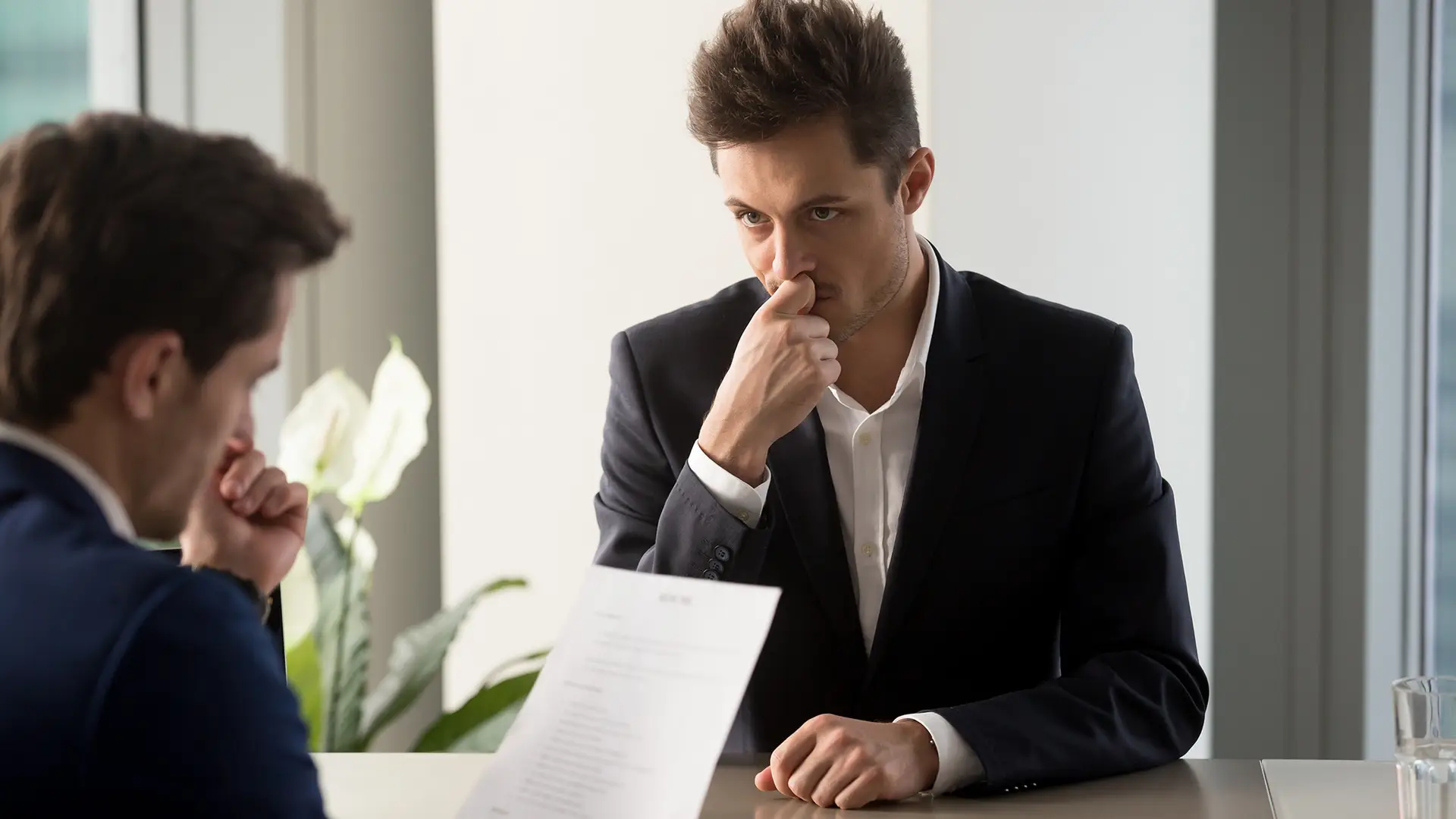Professional man waiting with concern during an interview